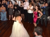 bride-and-guest-dance-in-middle-of-circle-to-music-of-detroit-party-band
