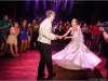 crowd-surrounds-bride-and-groom-on-dance-floor-at-detroit-wedding-reception