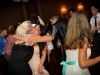 delighted-bride-and-friend-embrace-at-toledo-wedding-reception